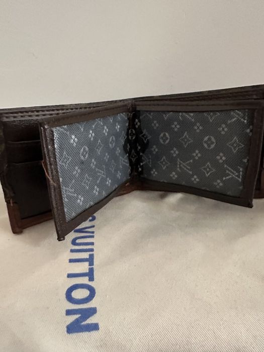 Louise Vuitton leather wallet