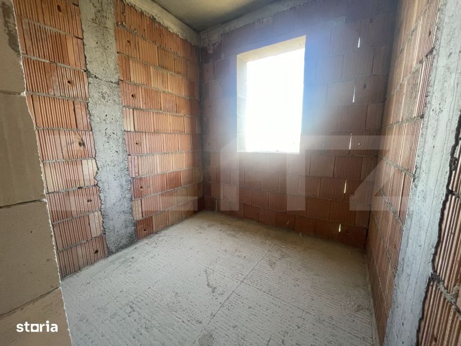 Apartament cu 3 camere, dispus pe doua niveluri, cu gradina