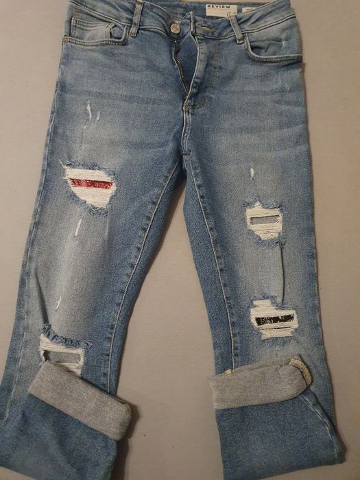 Vând blugi Review