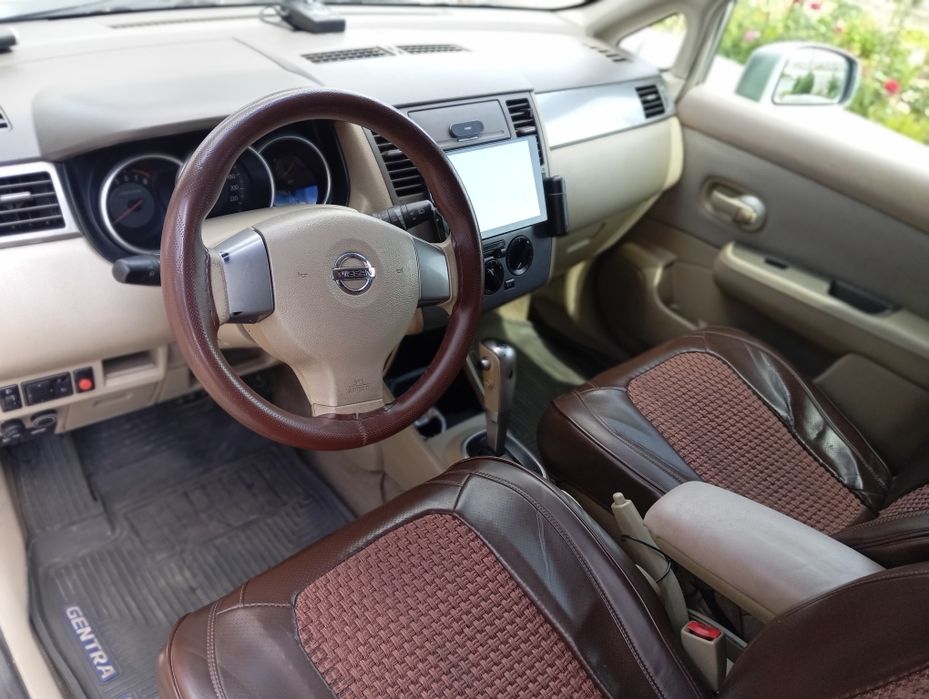Nissan tida 1.6 2006 yil seriy maksimum 300$ li ishi bor narxi 5500$