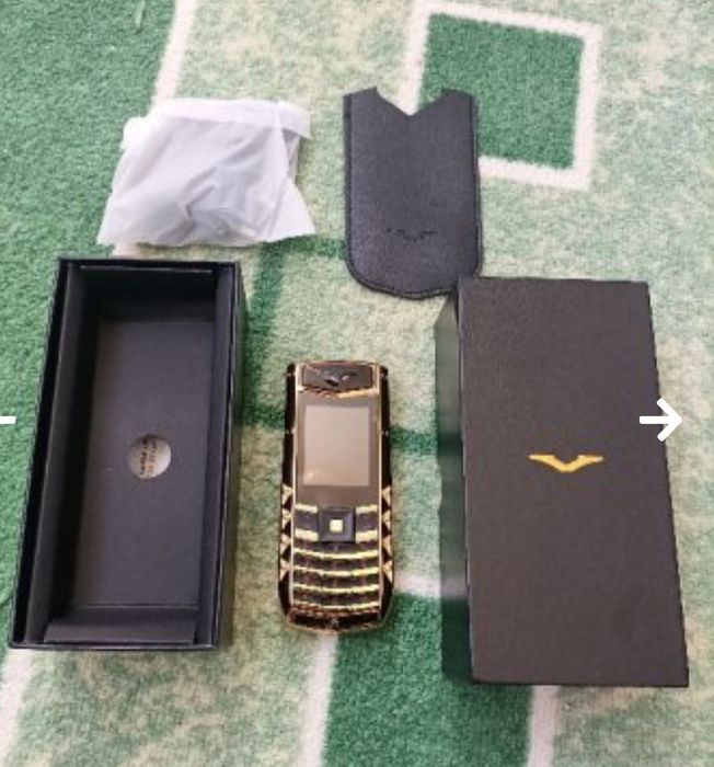 Мобилен телефон марка SERVO с две СИМ карти + кутия + зарядно - работи