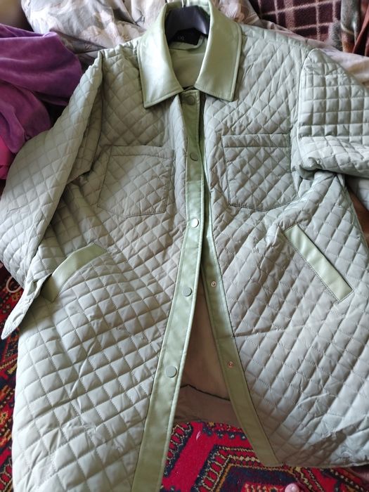 Продам куртки пуховики вещи