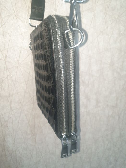 Продам новую барсетку .