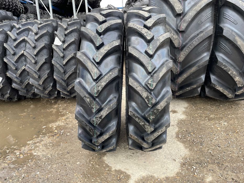 Anvelope noi 9.5-24 cu 8 pliuri pentru tractor fata marca OZKA