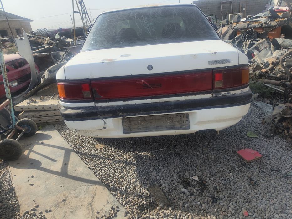 Мазда 323 задний стоп