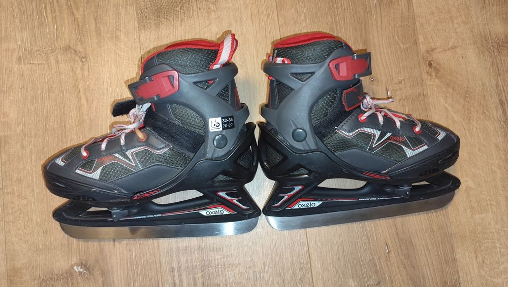 Vând patine gheata reglabile 32-35 copii, negru/rosu, stare f buna