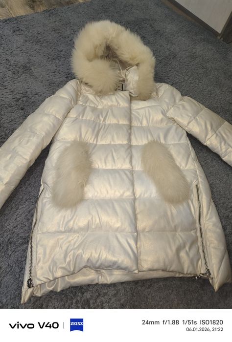 Продам пуховик зима женский