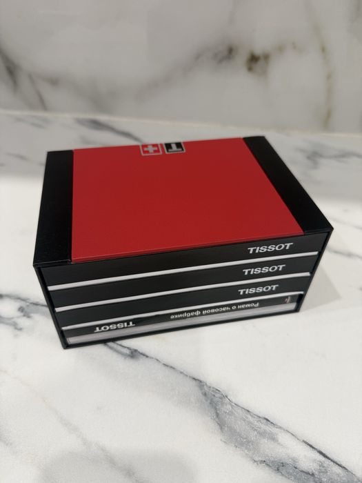 Часы фирма Tissot