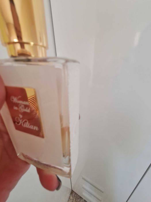 Kilian Woman in gold