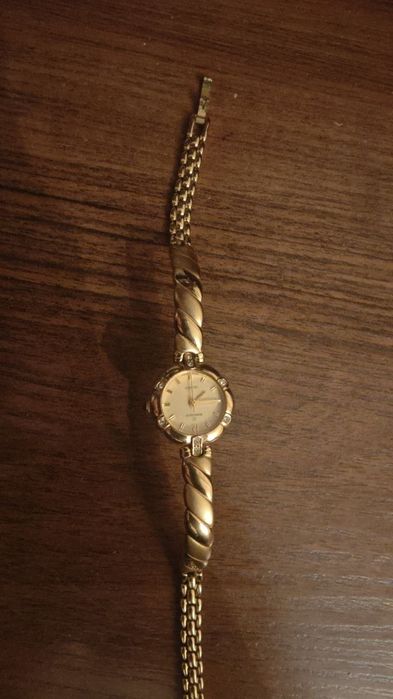 Продам женские часы Romanson