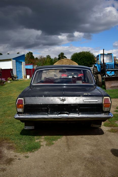 Автомобиль газ 2411