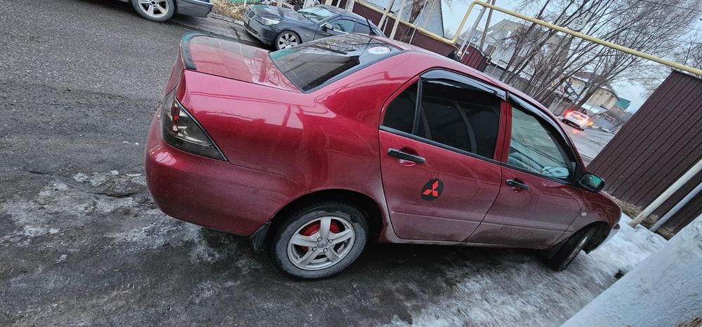 Митсубиси Лансер 9 поколение