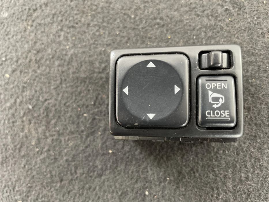 Buton reglaj oglinzi Nissan Navara D40 2006 cod 25570AX005