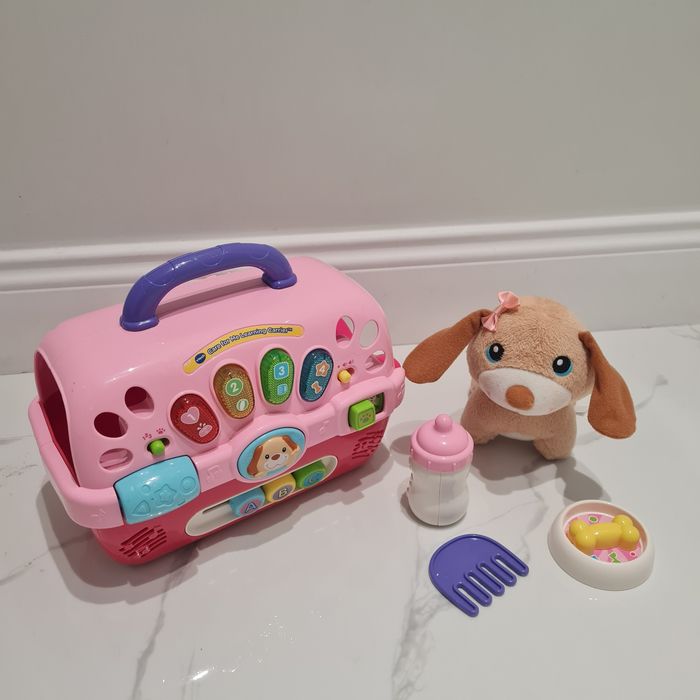 Интерактивна играчка Vtech с куче и клетка за пренасяне.
