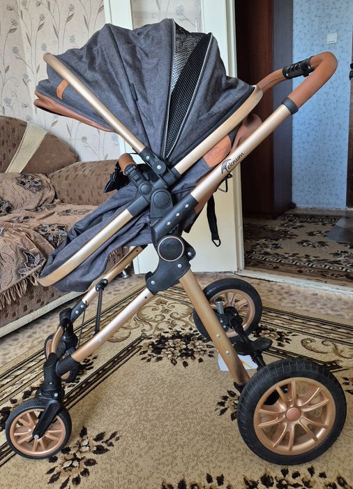 Детская коляска Тэкнум!
