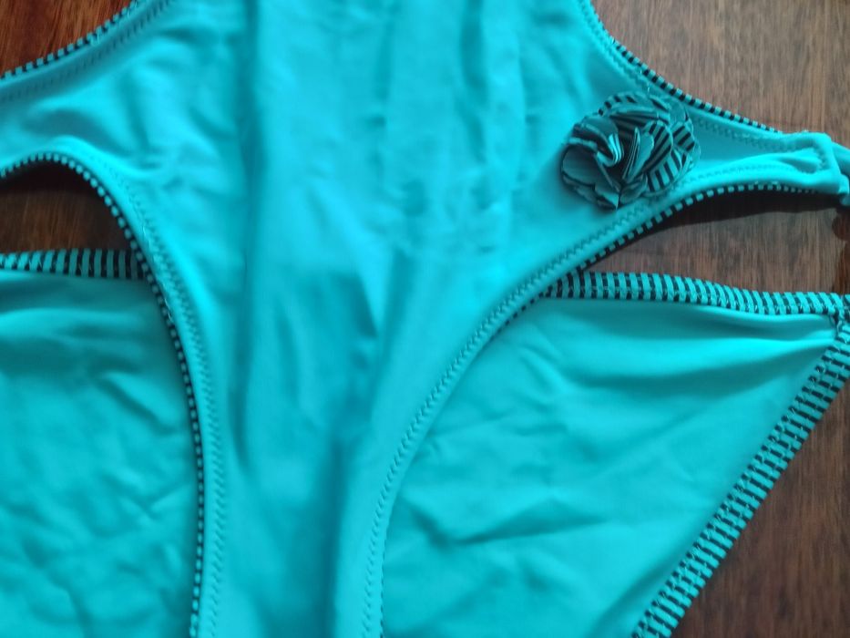 Продам женский купальник 48 размера