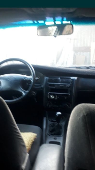 Продам машину тайота карина е