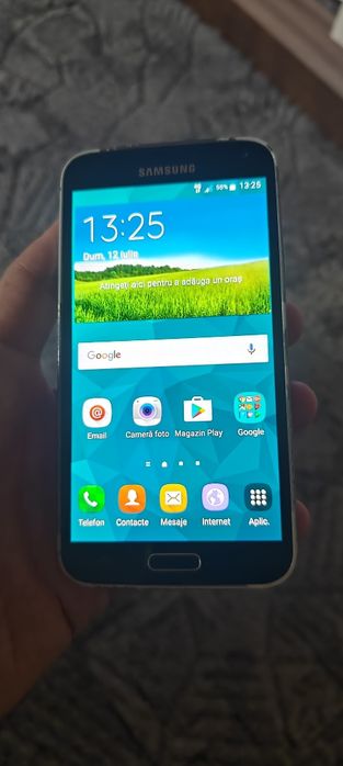 Samsung Galaxy S5 funcțional.