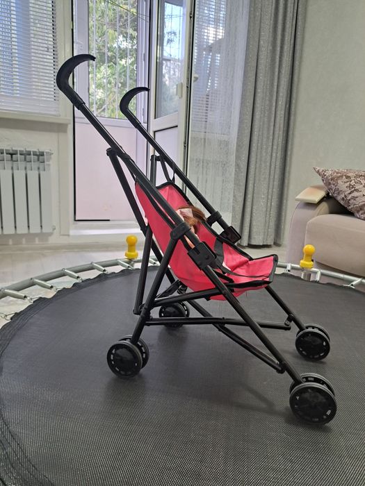 Продам игрушечную коляску