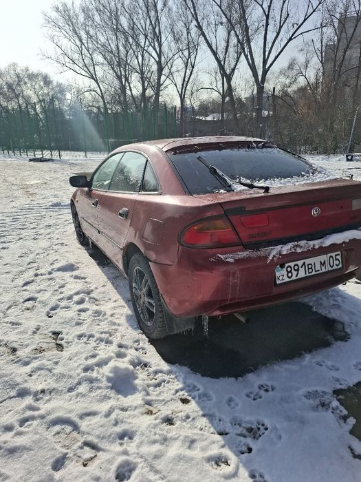 Срочно мазда 323