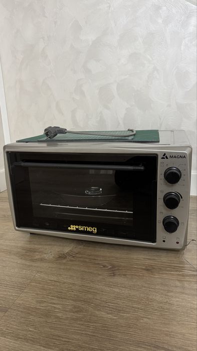 Продам Духовку Magna
