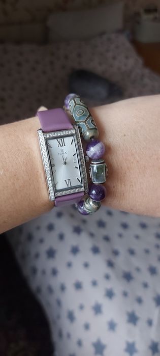 Серебряные часы Ника