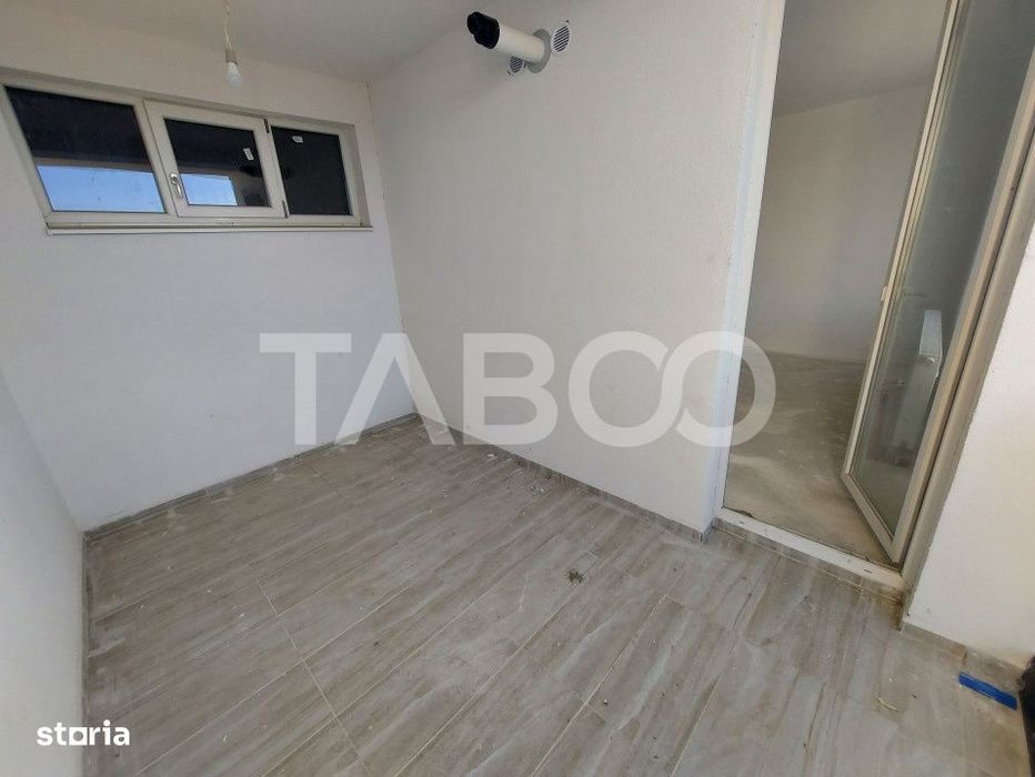 Apartament decomandat de vanzare 52 mpu 2 camere 2 logii loc parcare — fotografia 3