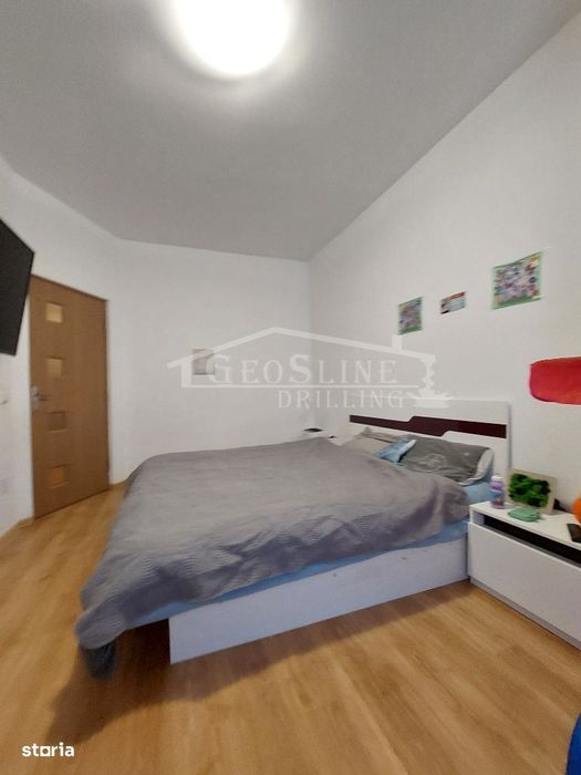 Apartament 2 dormitoare 1 Open-space Parcare privată extra