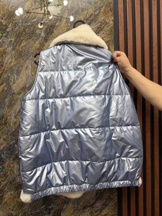 женский синий безрукавка