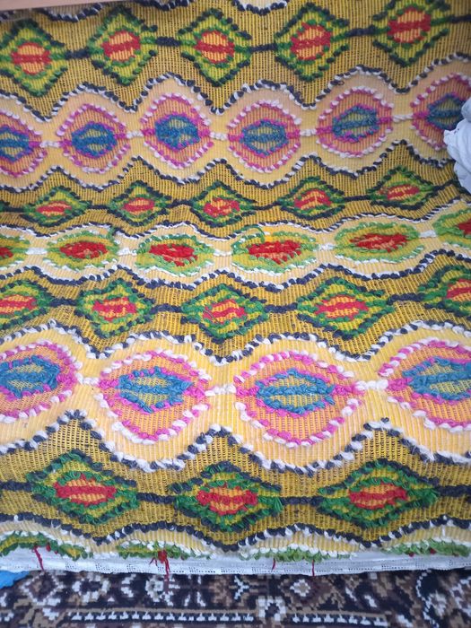 Cuverturi țesute manual