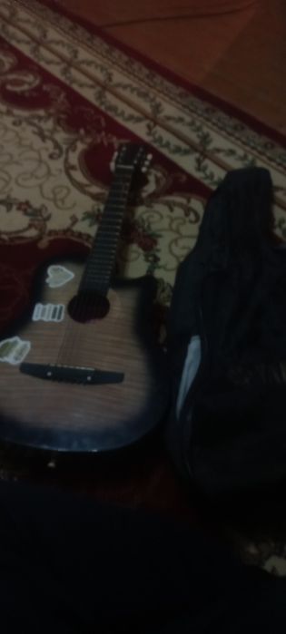 Гитара сатылады алам деушілер жазсын