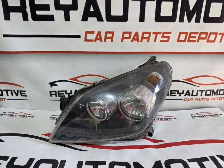 Far stanga Opel Astra H cod 24451032
