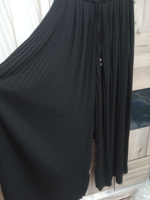 Юбки разные солнце клёш и плесированые а также юбка брюк