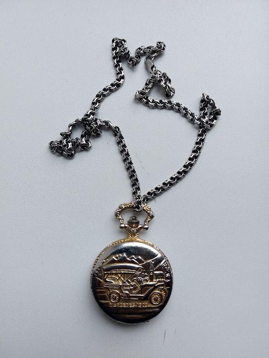 Старинный карманный часы.