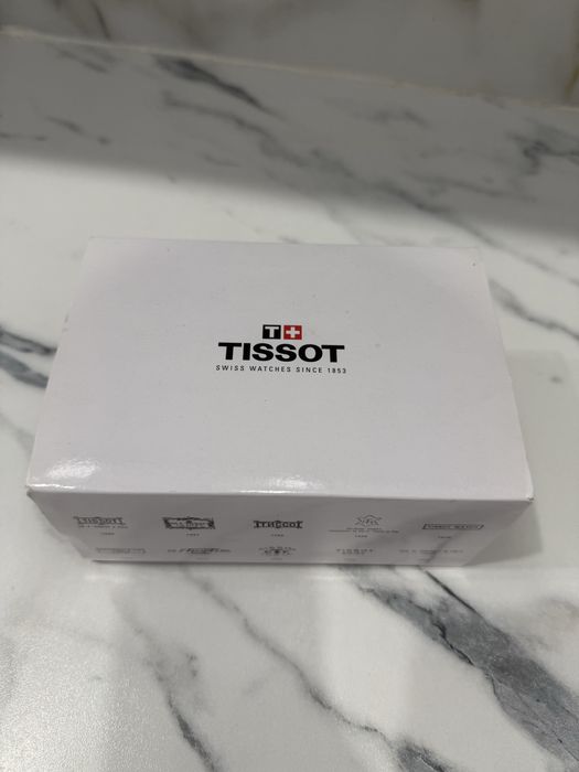 Часы фирма Tissot