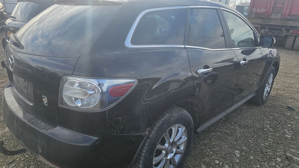 Dezmembrez Mazda CX7 2.3i L3K9