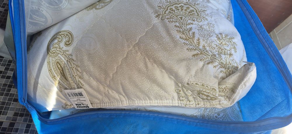 Продам одеяло и подушку новые