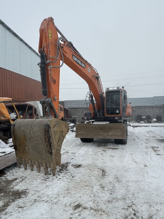 Аренда колесного экскаватора 210