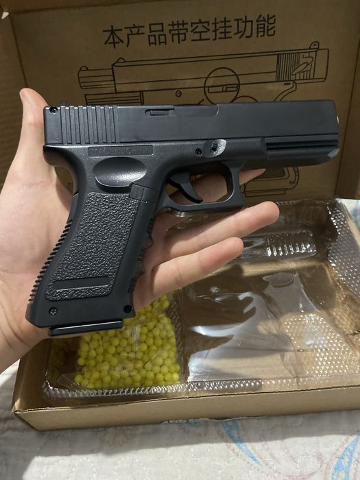 Игрушечный пистолет