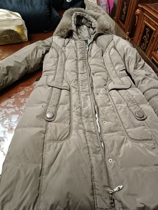 Продам пуховик серого цвета