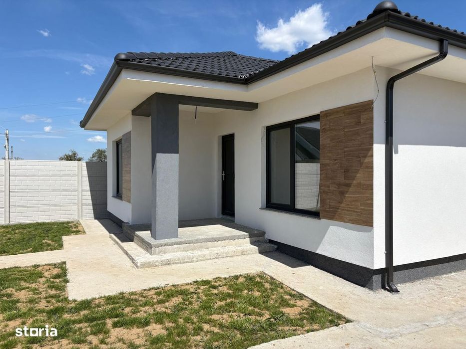 Casa noua cu PANOURI FOTOVOLTAICE, teren 553 mp, (utilitati complete)