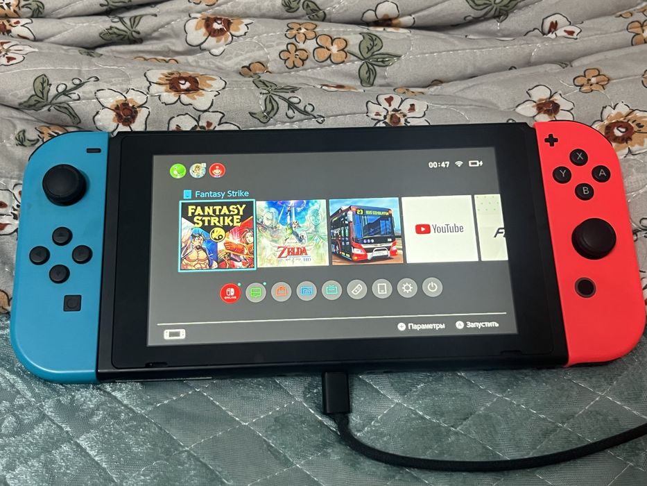 Нинтендо Свитч с игрой Zelda с причтавкой