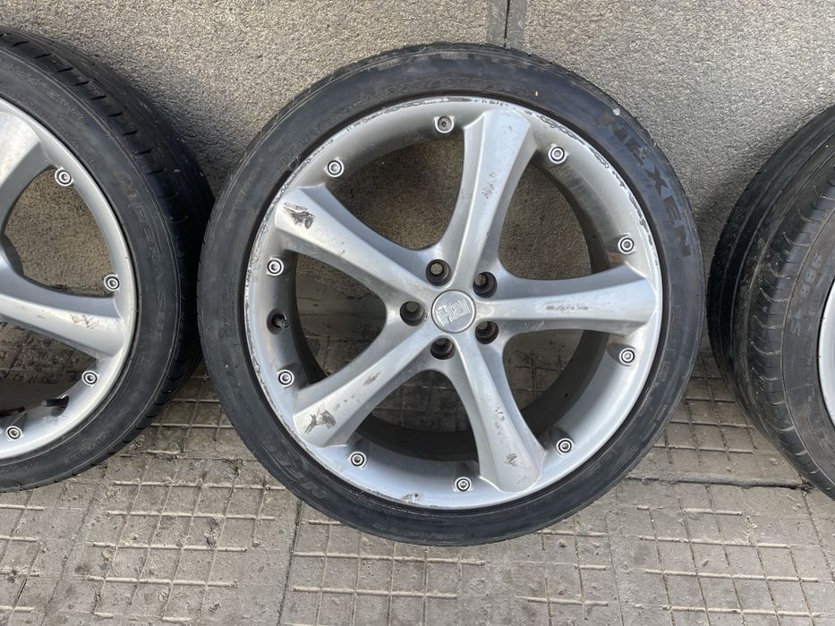 Джанти с гуми RH 18 5x112 63.6мм=57.1mm ET35 цен.отвор VW AUDI VAG