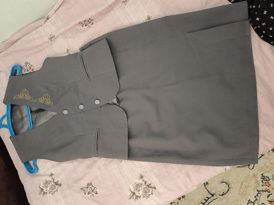 Мұғалімге арналған мектеп формасы