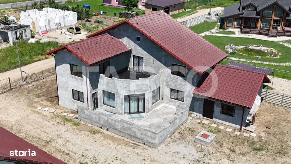 Casa individuala 5 camere 3 bai garaj 497 m teren liber Sat Sercaia