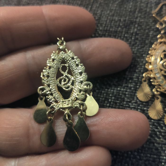 Лого на нота със камъчета