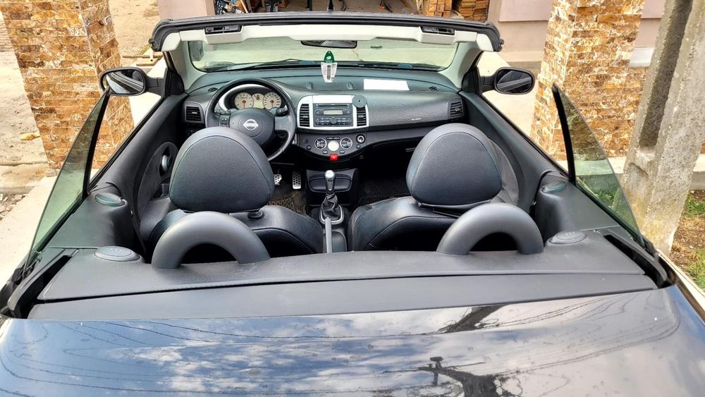 Nissan Micra 1,6 benzina decapotabil,  impecabil  Accept schimb cu  autoturisme s-au cu oi.