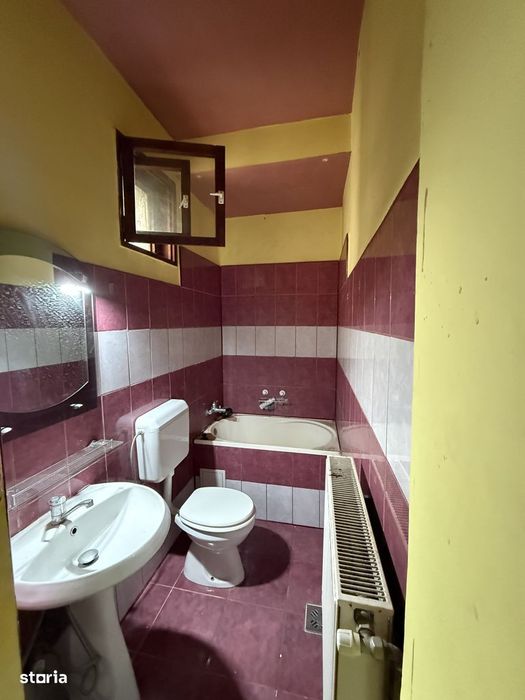 Apartament la curte comuna, 2 camere, 48 mp utili si teren comun 550 m