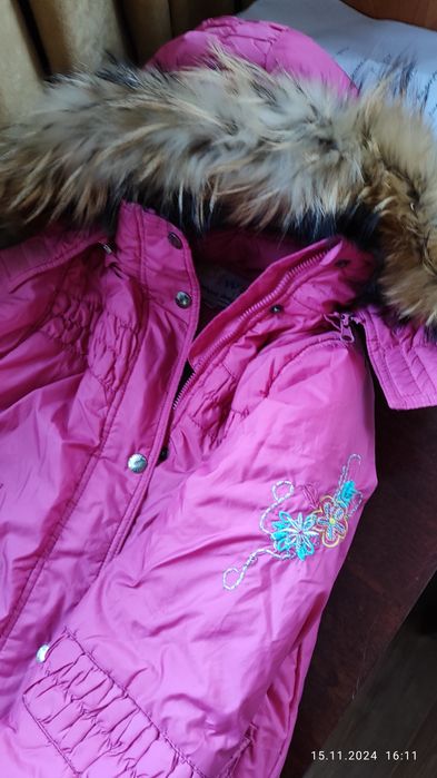 Зимние комбинезоны и куртки.