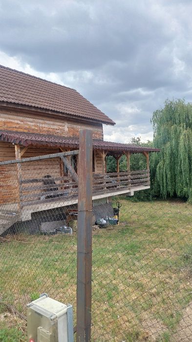 Vând  casa din bârne lemn